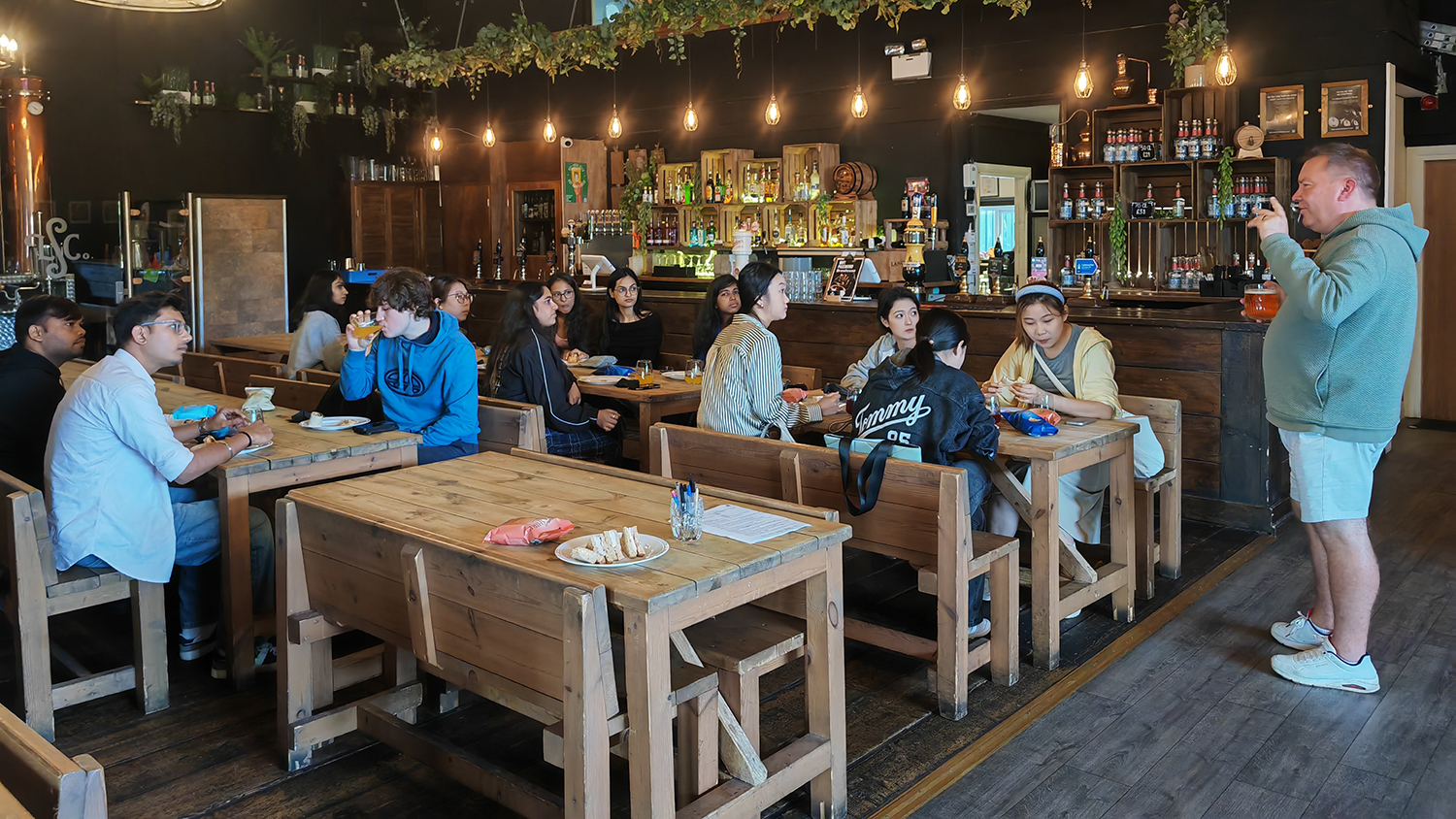 Students sat around tables in the brewery