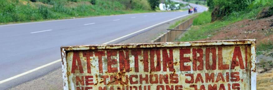 A roadside sign warning of Ebola