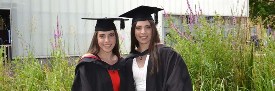 Identical twins Elpida and Rafaella Louca, who have graduated with a first-class degree in Mathematics 