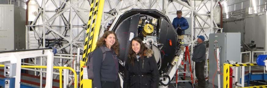 Veronica Ferreios Lopez and Dr Julie Wardlow at the back of the 10m primary mirror on the Keck 1 telescope.