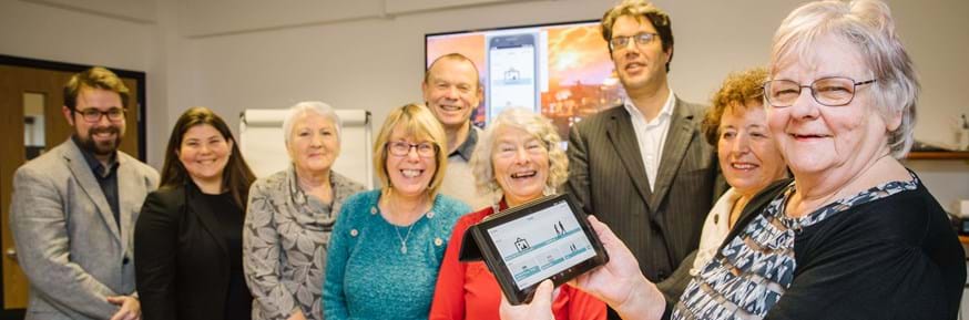 Professor Niall Hayes with Dr Chris Bull (Computing) and some of the older adults who helped design the new app