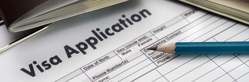 Passport and Visa application form with pencil