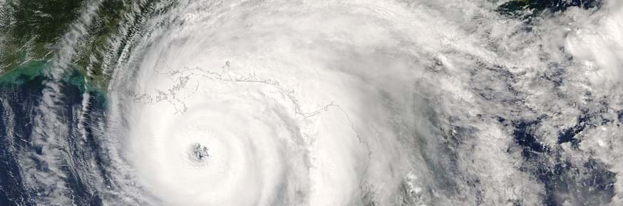 The eye of a hurricane is see from space above Florida and the Gulf of Mexico