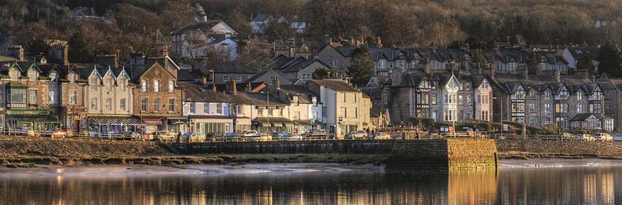The seafront at Arnside, in South Cumbria, with shops and businesses lining the street.