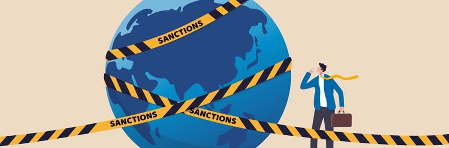 A graphic depicting the world bounded by a tape with the word 'sanctions' emblazoned on it
