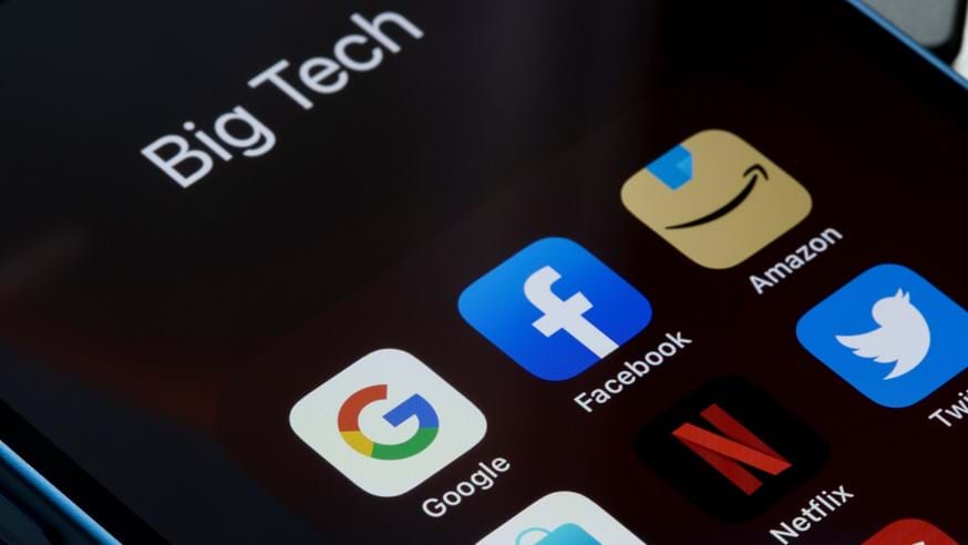 image of a smart phone screen displaying icons of 'big tech' companies including Google, Facebook, Netflix and Amazon
