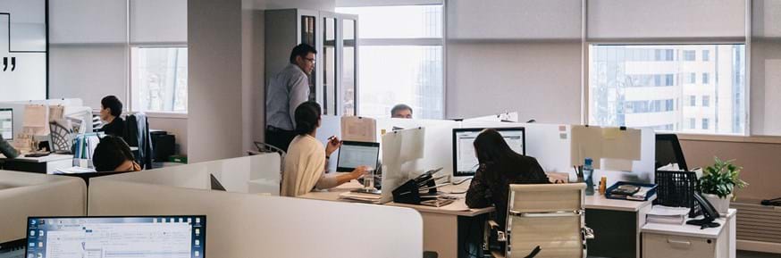 Picture of employees in an open-plan office