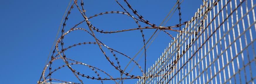 Blue sky and barbed wire