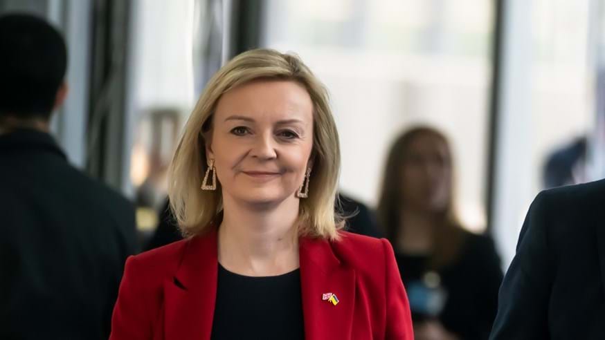An image of Liz Truss smiling at the camera