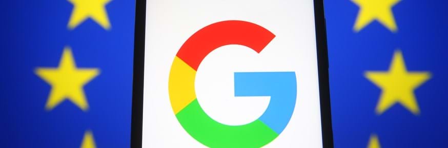 Google logo against an EU flag backdrop