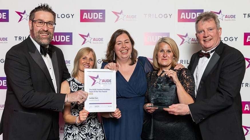 Facilities Leadership team receiving the AUDE award