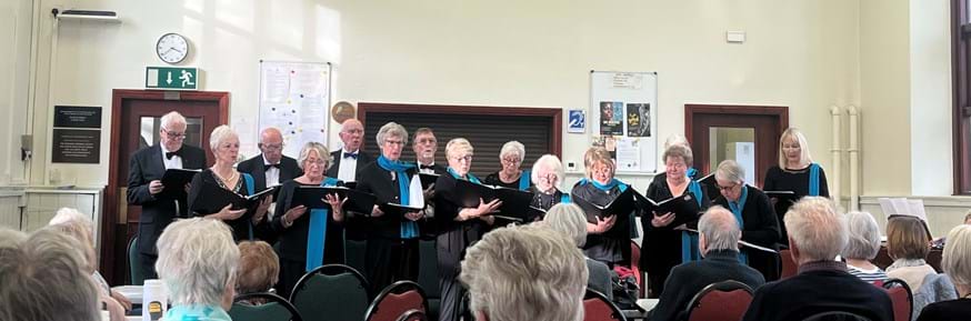 An image if the June Baker Singers in choir