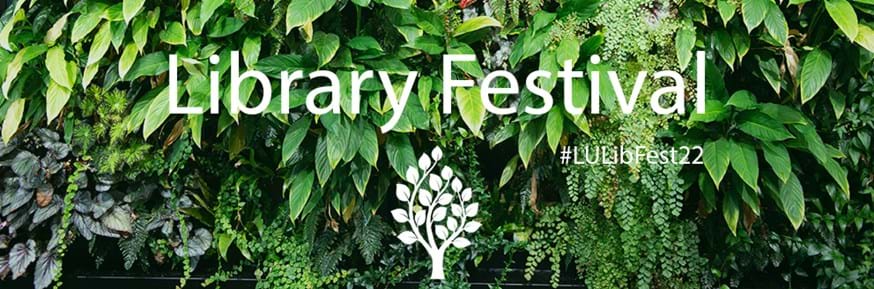 Library festival image with backdrop of living wall.