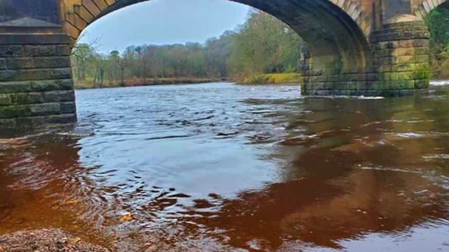 River Lune with brown coloured water