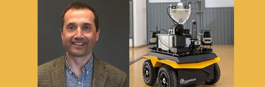 Professor Malcolm Joyce of Lancaster University and a TORONE robot from Lancaster University and the University of Manchester