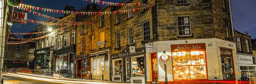 Brightly coloured image of Lancaster city Centre at night