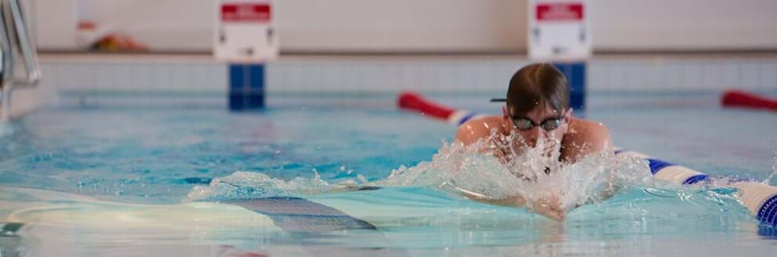 Person swimming at Sport Lancaster