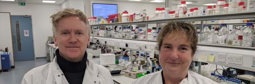 Lancaster University's Professor Paul Farley with Professor Anne McArdle in the lab at Liverpool University