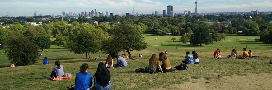 People sitting in a park in London