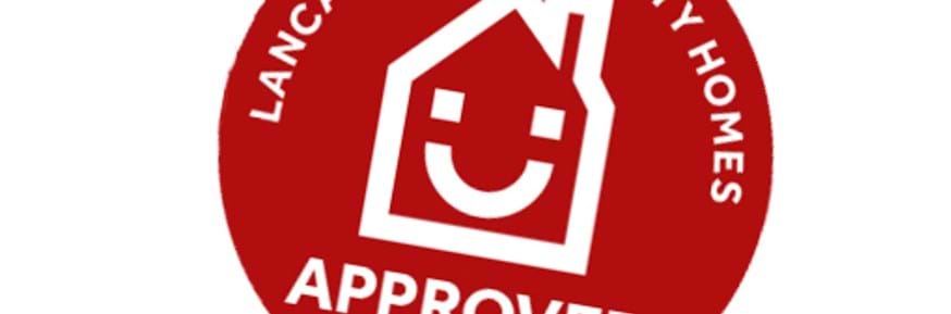 Lu Homes approved text on red background