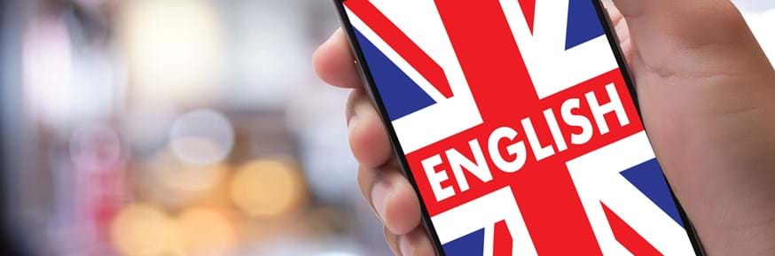 Hand with mobile phone and the word English set against a Union flag backdrop