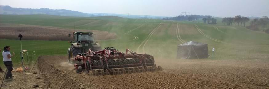 Soil tillage equipment moves large amount of material down slope as it is pulled through the soil